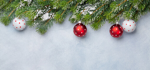 Christmas greeting card with fir tree and decor