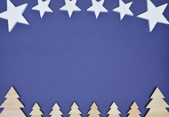 Assortment of Christmas decorations on blue background. Merry Christmas. Space for text or idea.