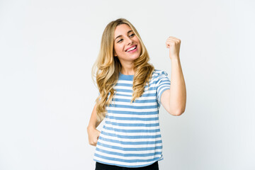 Fototapeta premium Young caucasian blonde woman cheering carefree and excited. Victory concept.