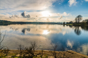 A view towards the setting sun across Pitsford Reservoir, UK in winter