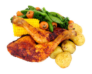 Roast piri piri chicken leg meal with vegetables isolated on a white background