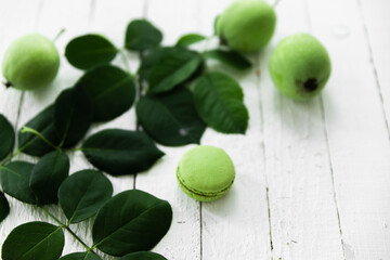 Green macaroon food photo with green leaves