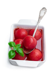 Homemade peeled tomatoes in tomato juice in ceramic bowl isolated on white