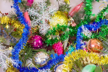 Fototapeta na wymiar Christmas tree decorations and garlands close-up
