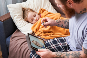Man making video call with his doctor