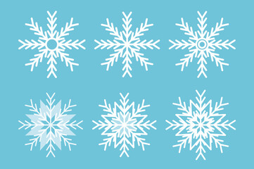 Fototapeta na wymiar Snowflakes set in beautiful style. Flakes vector illustration. Blue background vector. Isolated vector illustration. Winter background. Traditional winter holiday.