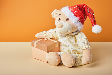 cute plush teddy bear in santa claus hat