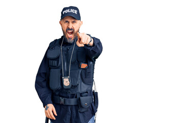 Young handsome man wearing police uniform pointing displeased and frustrated to the camera, angry and furious with you