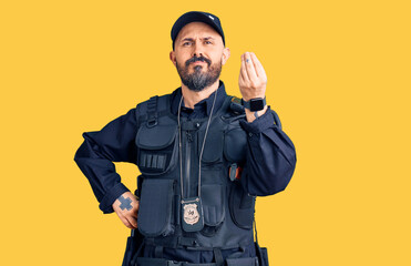 Young handsome man wearing police uniform doing italian gesture with hand and fingers confident expression