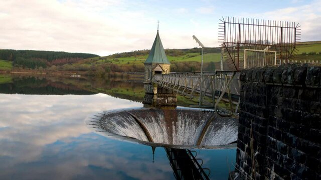 Pontsticill Reservoir with Bell-mouth spillway and valve tower, South Wales, United Kingdom