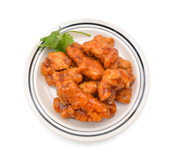 Chicken wings with sauce on white background 