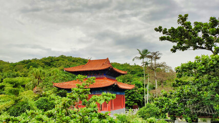 Fototapeta na wymiar View of the pagoda, pavilion and tree tops. Nanshan Cultural Tourism Zone. Sanya. Hainan Island. China. Asia