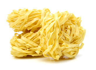 Egg noodles on a white background