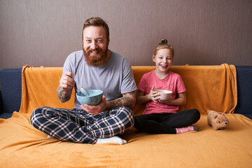 Family eating healthy breakfast at home