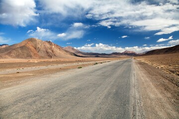 Fototapeta na wymiar Pamir highway road in Tajikistan mountain landsscape
