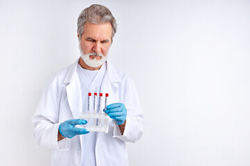 doctor examining, studying the coronavirus tests in tube, make analysis. isolated over white background