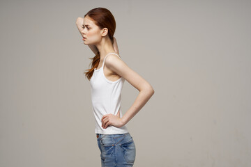 pretty woman in t-shirt and jeans studio freedom