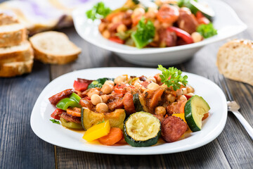 Spanish pot - pot meal with vegetables and sausage