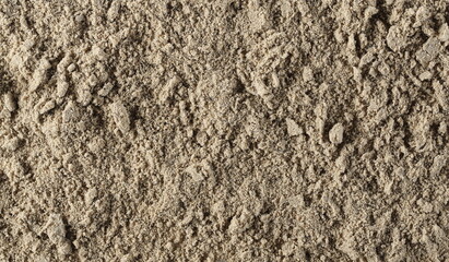 Sunflower flour pile background and texture