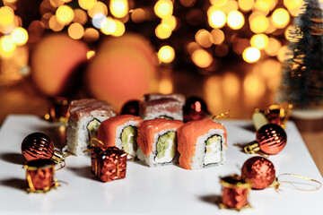 Sushi rolls New Year. Christmas background. Idea for postcard, menu, advertising.