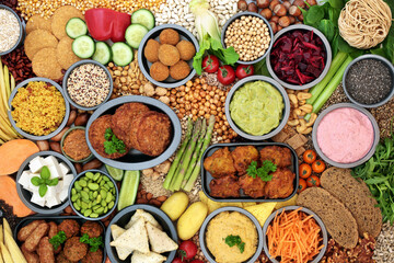 Vegan and  vegetarian food for a healthy lifestyle with plant based foods high in antioxidants, protein, minerals, fibre, carotenoids, anthocyanins, vitamins, omega 3 and smart carbs. Top view.