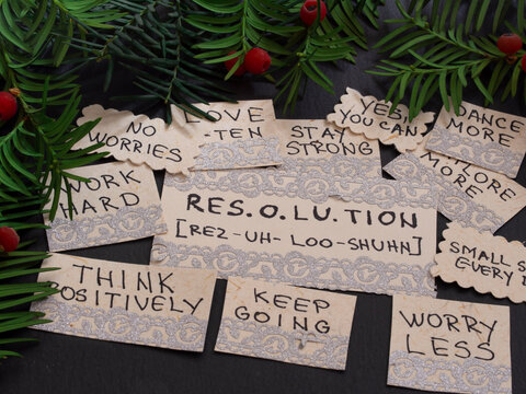 New Year's Resolutions, paper notes on the wooden table