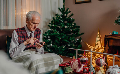 Elderly Senior Man Texting on Mobile Phone