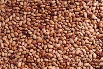 Macro full frame shot of pinto beans. High resolution background image of dry beans. 