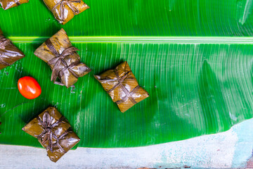 Latin america food "nacatamal"  of Nicaragua, also known as "tamales" or "pastel en hoja" in countries as Mexico, Dominican Republic, Costa Rica, Honduras, El Salvador, Venezuela, Colombia, and others