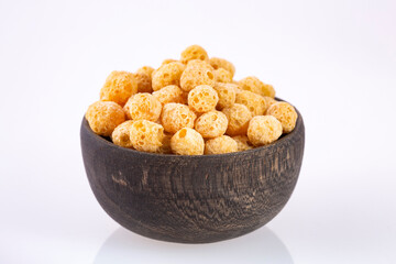 Organic quinoa pop seeds in the wooden bowl - Chenopodium quinoa.