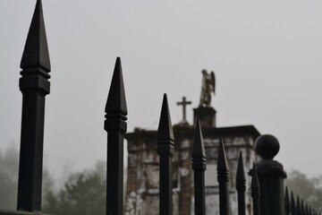 cemetery, iron fence, stone angel, mausoleum