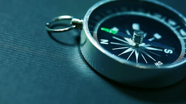 Rotating compass arrow. Tool for navigation HD video 1920x1080. Shalow depth of field