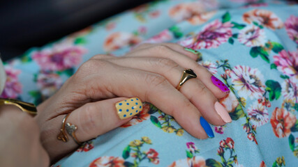 hand with colorful nails