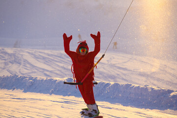 Snowboarder in funny shrimp costume
