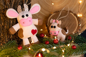 Christmas toys on the handmade Christmas tree. themed decor for a cozy home. new year concept. handmade bull