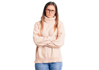 Beautiful caucasian woman wearing wool winter sweater skeptic and nervous, disapproving expression...