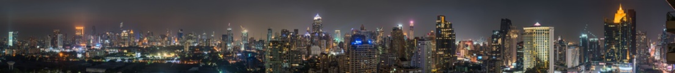 Fototapeta premium Wide Panoramic View of Bangkok City at Night, Thailand
