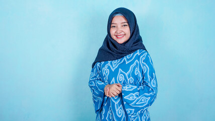 Image of happy asian hijab business woman posing isolated background