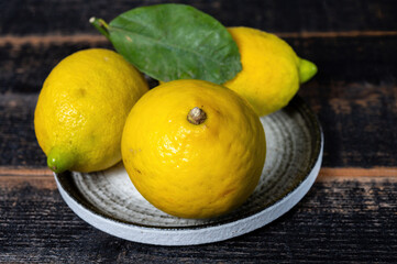 Fresh ripe bergamot orange fruits, fragrant citrus used in earl grey tea, medicine and spa treatments