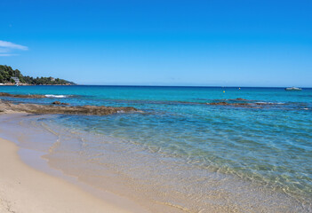 Summer vacation on French Riviera, crystal clear azure blue water of  Mediterranean sea in Saint Clair near Le Lavandou, Var, Provence, France