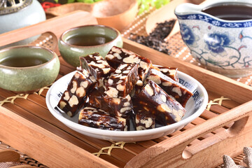 Walnut with Date Cake  on the white plate
