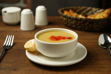 Lentil soup with a slice of lemon