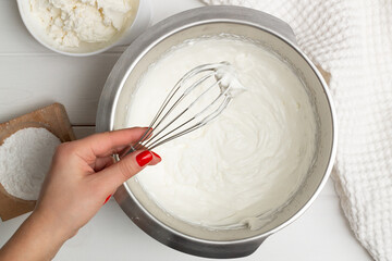 Step-by-step heart-shaped cake recipe. Step 7, cream: Whisk cream with 0,5 sugar, add the rest of powder and ricotta.