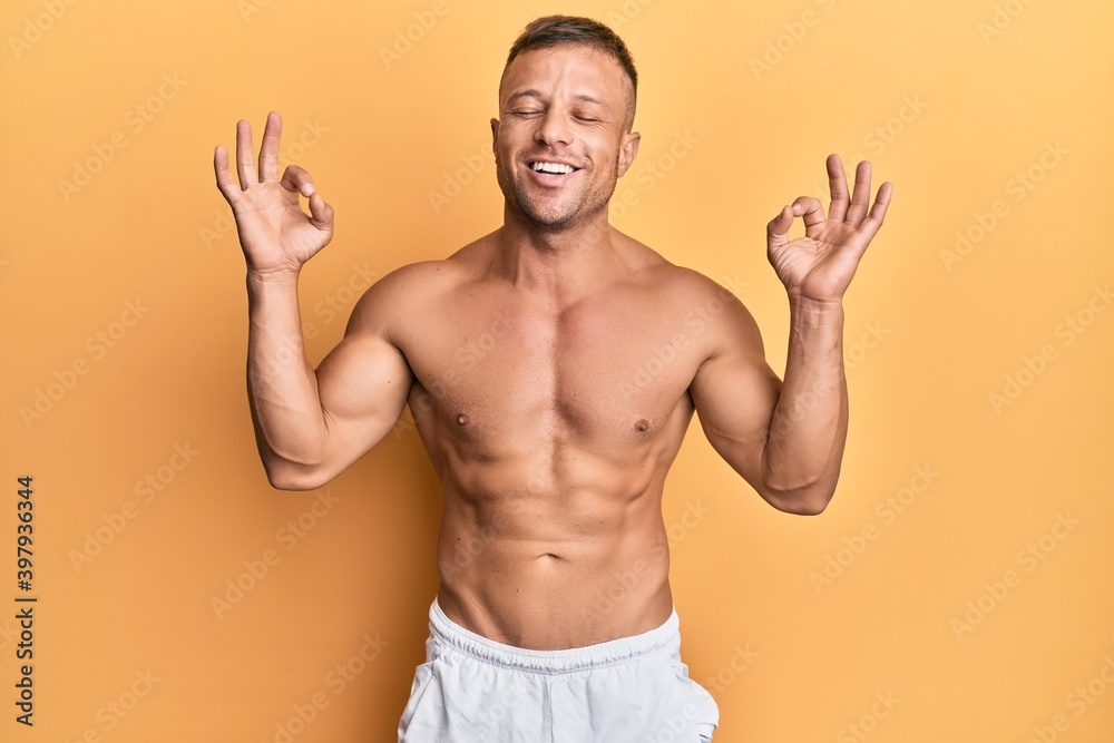 Sticker handsome muscle man standing shirtless relax and smiling with eyes closed doing meditation gesture w