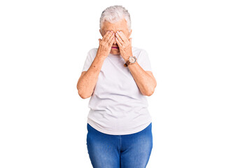 Senior beautiful woman with blue eyes and grey hair wearing casual white tshirt rubbing eyes for fatigue and headache, sleepy and tired expression. vision problem