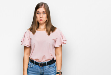 Obraz premium Beautiful caucasian woman wearing casual clothes depressed and worry for distress, crying angry and afraid. sad expression.