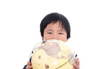 A little Chinese girl in front of a white background is studying with a globe