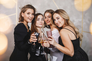 Group of women celebrate.