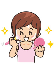 チークを塗る女性　美容　ビューティー　化粧　メイク