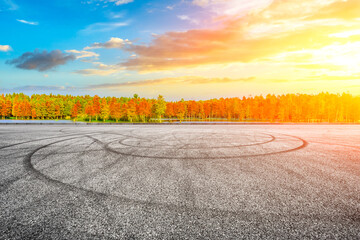 Empty asphalt road and colorful forest natural landscape in autumn season.